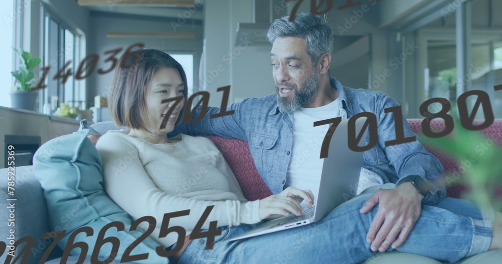 Image of data processing over diverse couple using laptop Image of data processing over diverse couple using laptop