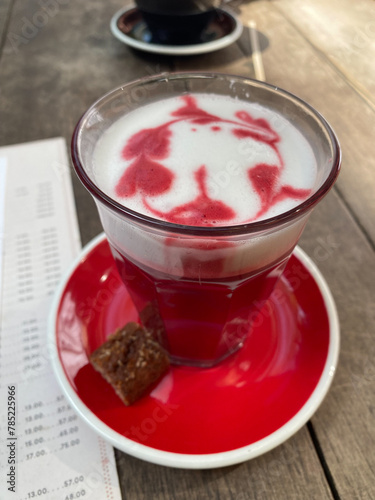 pink beetroot latte with foam. Vegetable drink.