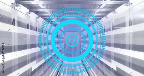 Image of loading circles with illuminated bars moving on server racks in data center