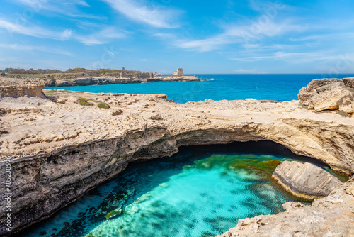 The famous Grotta della Poesia, cave with turquoise water in Puglia, Italy
