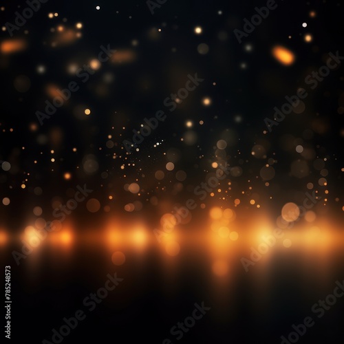 Orange abstract glowing bokeh lights on a black background with space for text or product display