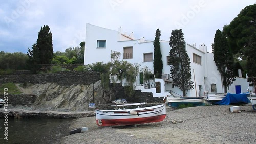 Partial view of Port Lligat (Cadaqués) with the house of the painter Salvador Dalí. Cadaqués. Natural Park of Cap de Creus, Costa Brava, Alt Empordar, Catalonia, Spain. photo