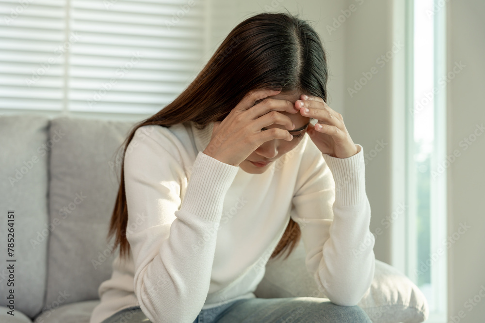 Depression and mental illness. Asian woman disappointed, sad after receiving bad news. Stressed girl confused with unhappy problems, arguing with boyfriend, cry and worry about unexpected pregnancy. Depression and mental illness. Asian woman disappointed, sad after receiving bad news. Stressed girl confused with unhappy problems, arguing with boyfriend, cry and worry about unexpected pregnancy.