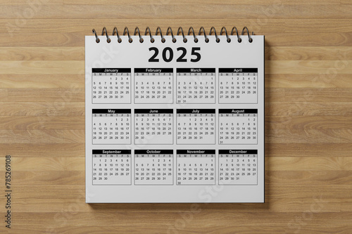 Calendar year 2025 schedule on wood table, wooden background. 2025 calendar planning appointment meeting concept. New Year. plans for 2025. top view