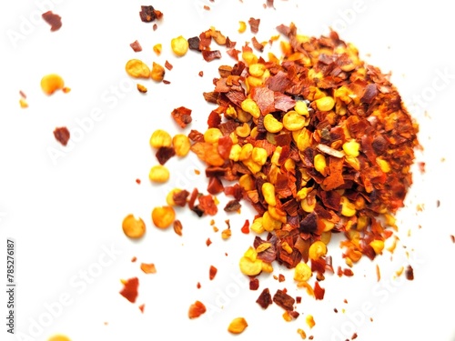 Chilli flakes on a white background.