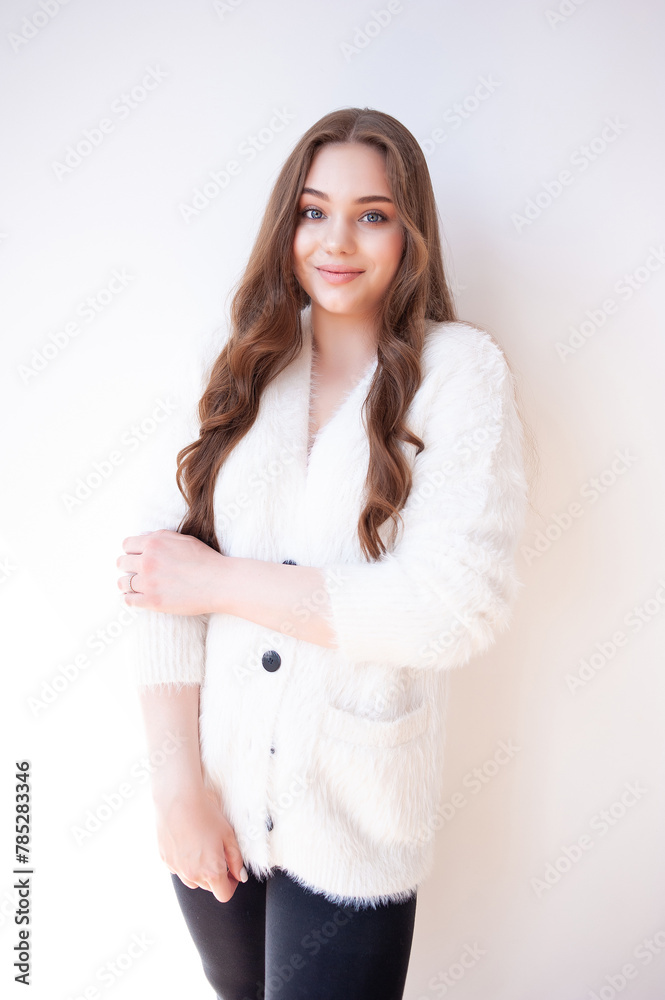 young woman with long brown hair and beautiful smile. young woman with long brown hair and beautiful smile.