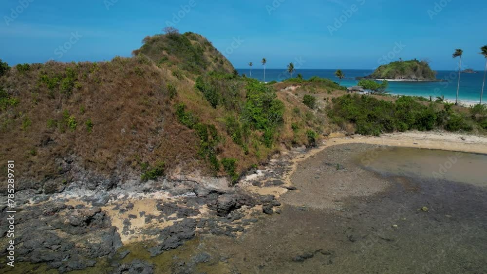 4K Aerial Drone video of Twin beach and Nacpan beach with beautiful sand and palm trees in Calibangbangan, Linapacan, Palawan, Philippines 4K Aerial Drone video of Twin beach and Nacpan beach with beautiful sand and palm trees in Calibangbangan, Linapacan, Palawan, Philippines