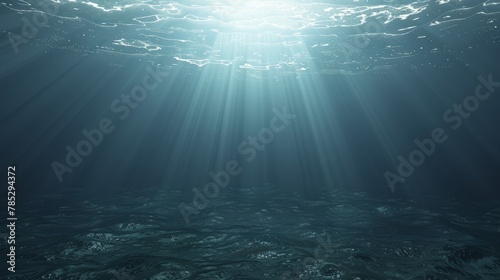  An underwater perspective of clear water, sunlight penetrating from surface above, and sunrays reaching the water's depth