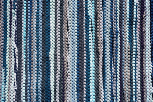 a closed up view pattern of fabric selected. Hand made blue woven rug makes a good texture