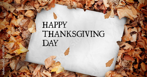 Image of happy thanksgiving day text over card with autumn leaves
