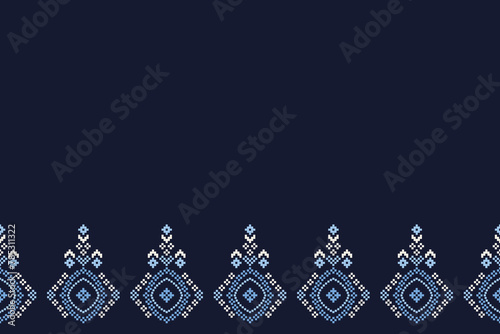 Traditional ethnic motifs ikat geometric fabric pattern cross stitch.Ikat embroidery Ethnic oriental Pixel navy blue background. Abstract,vector,illustration. Texture,scarf,decoration,wallpaper. photo