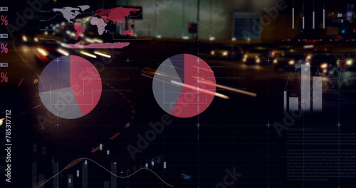 Image of statistical data processing against aerial view of city traffic at night