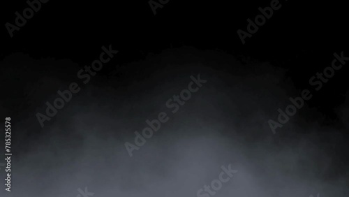 Slow motion of white smoke, fog, mist, vapor on a black background.  smoke fog effect. Abstract white smoke texture floating softly on dark background with swirls and waves
 photo