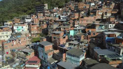 Aerial swooping into favela houses in Rio de Janeiro, Brazil photo