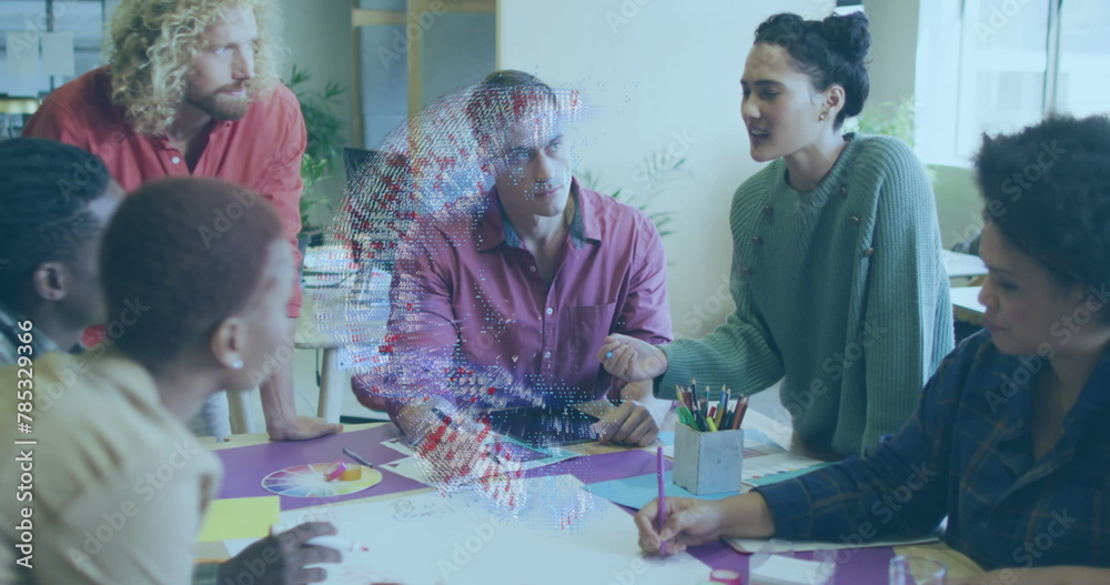 Fototapeta premium A group of happy diverse business people are discussing work during a meeting at a modern office