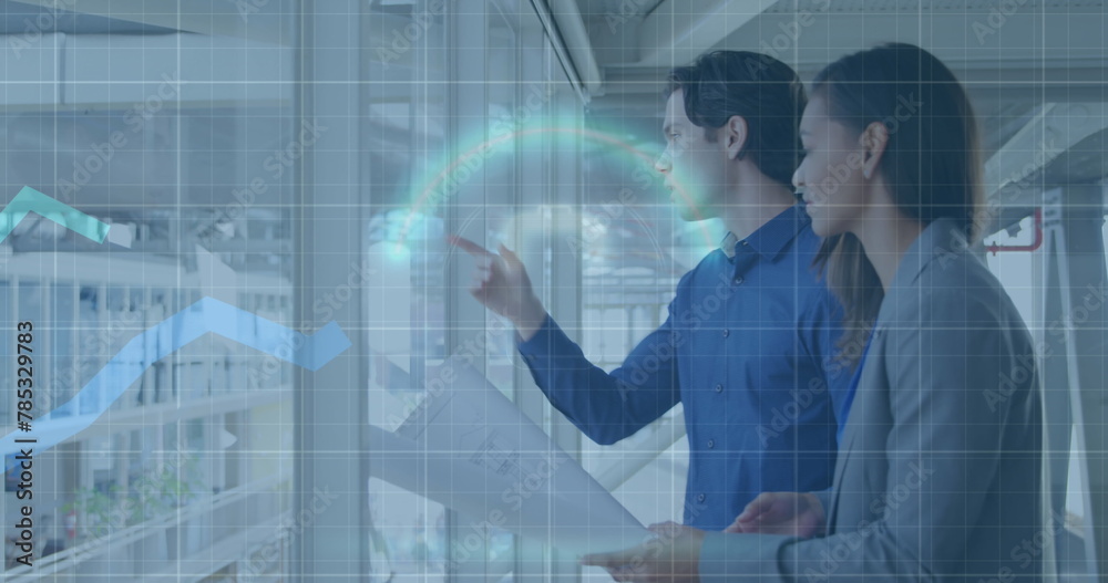 Image of financial data processing over diverse business people working at office Image of financial data processing over diverse business people working at office