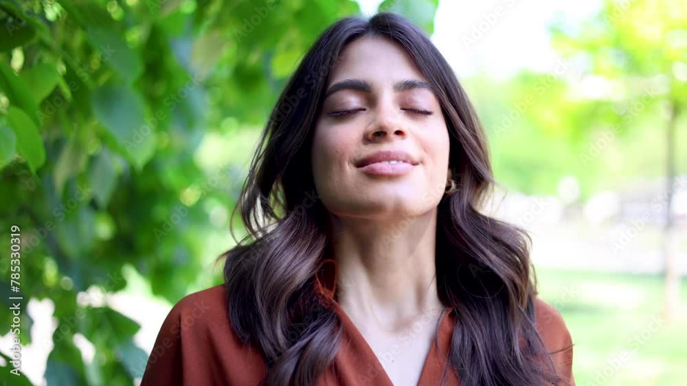 Portrait of a beautiful Latin American woman enjoying in the park Portrait of a beautiful Latin American woman enjoying in the park