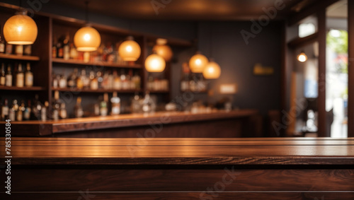 A wooden bar with bottles on shelves behind it