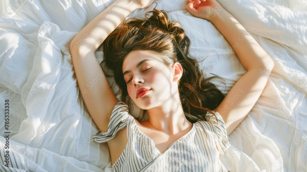Naklejka premium Content Woman Relaxing on Bed with Arms Stretched, Enjoying Serene Moment