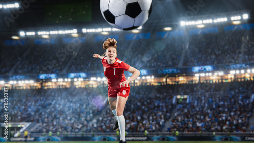 Aesthetic Shot Of Athletic Female Soccer Football Player Doing A Head Kick On Stadium With Crowd Cheering. International Championship Final Match on Arena Full Of Loyal Fans Of The Team.