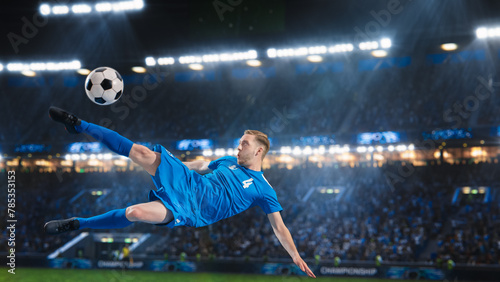 Aesthetic Shot Of Athletic Caucasian Soccer Football Blue Team Player Doing Beautiful Overhead Kick On Stadium With Crowd Cheering. International Championship Match on Arena Full Of Loyal Fans.