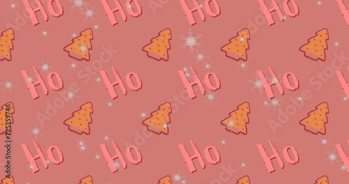Image of ho ho ho text and snow falling over gingerbread trees in winter scenery
