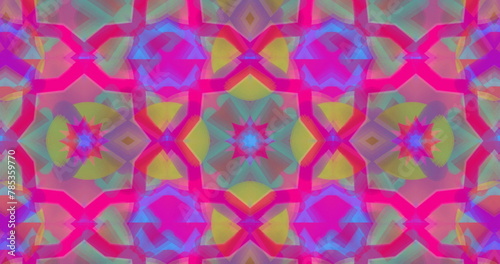 Image of kaleidoscopic colourful pink, green and yellow shapes moving hypnotically on purple backgro photo