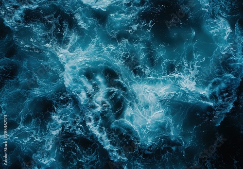Abstract blue water texture background with sea waves and foam