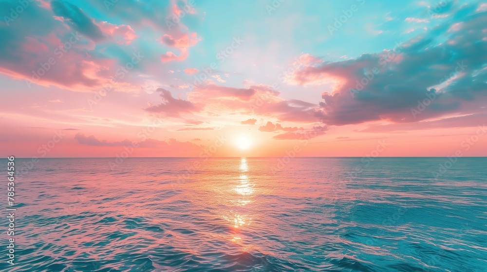 Beautiful sunset over the sea with pink and orange sky
