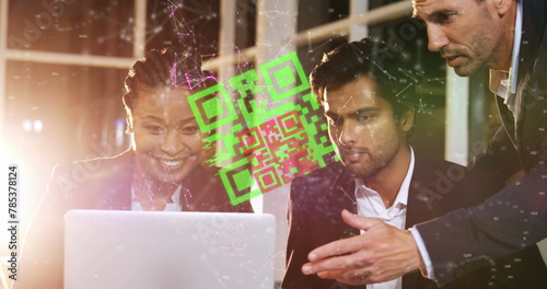 Image of connected dots and qr code over multiracial coworkers discussing over laptop in office