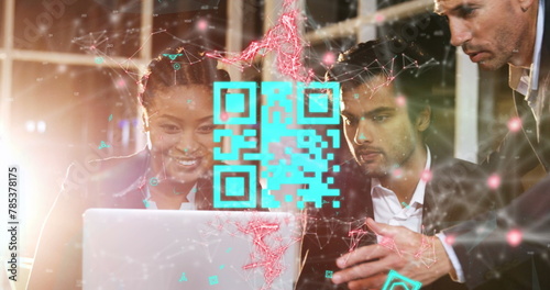 Image of qr code and connected dots over multiracial coworkers discussing over laptop in office