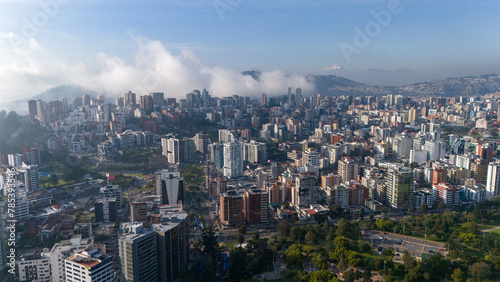 Aerial drone view of Quito capital city of Ecuador South America Parque La Carolina Sunrise early morning traffic © John
