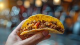 Hand Holding Greasy Taco with Gym Equipment Blurred in Background, Illuminated, Representing Contrasting Desires vs. Reality Concept.