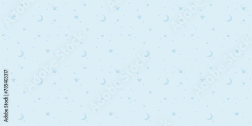 Pretty seamless pattern of light blue stars and moons of various sizes on a light blue background
