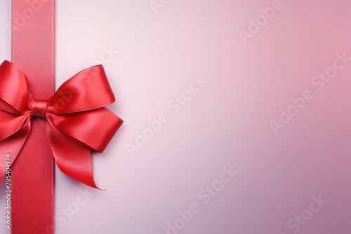 Red ribbon with bow on lavender background, Christmas card concept. Space for text. Red and Lavender Background