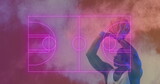 Image of pink court and explosion over african american male basketball player shooting ball