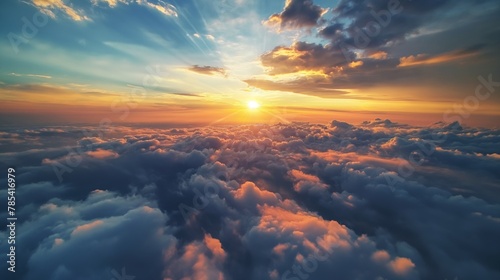 Sunrise against the sky and clouds photo