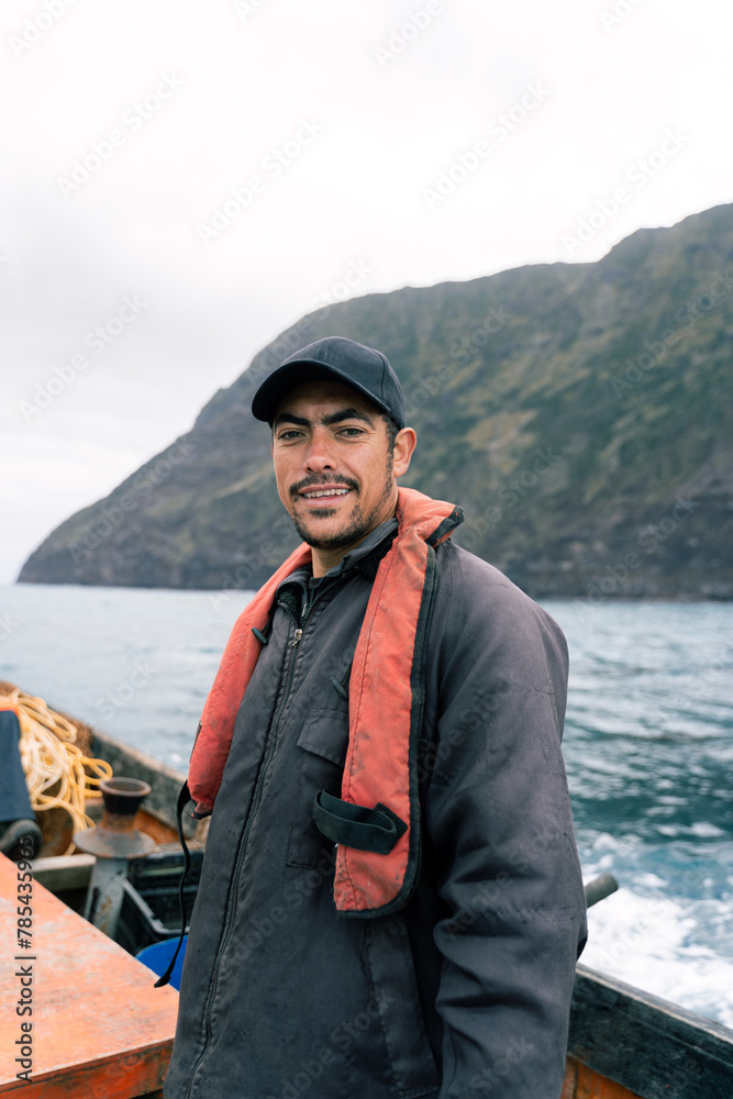 Portrait of a fisherman in a boat