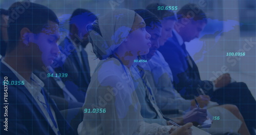 Image of numbers processing over diverse business people photo