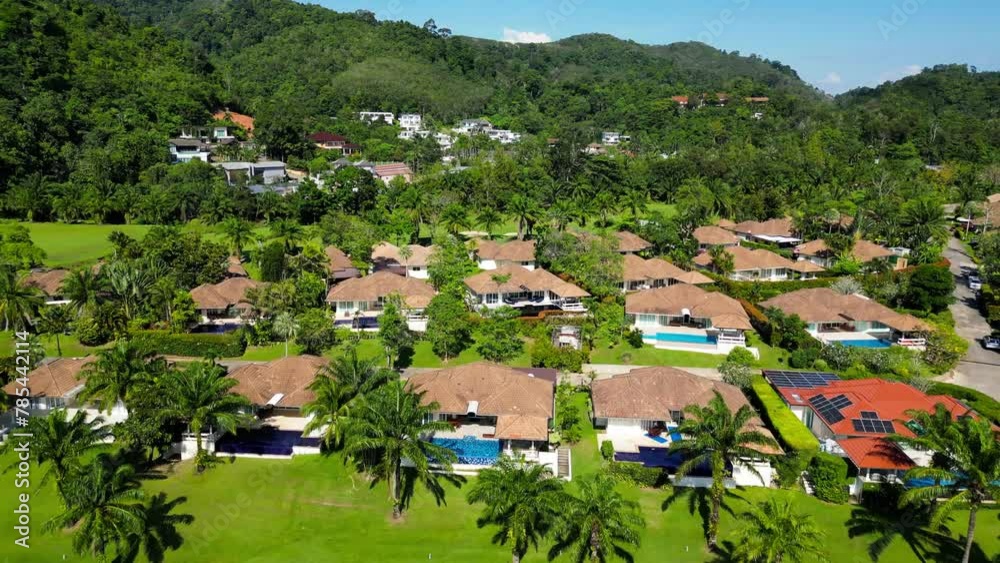 Golf course among palm trees. Drone video. Golf course among palm trees. Drone video.