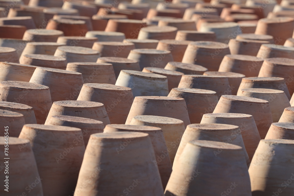 Fototapeta premium making and preparing clay pots outdoors