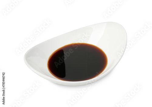 Tasty soy sauce in gravy boat isolated on white