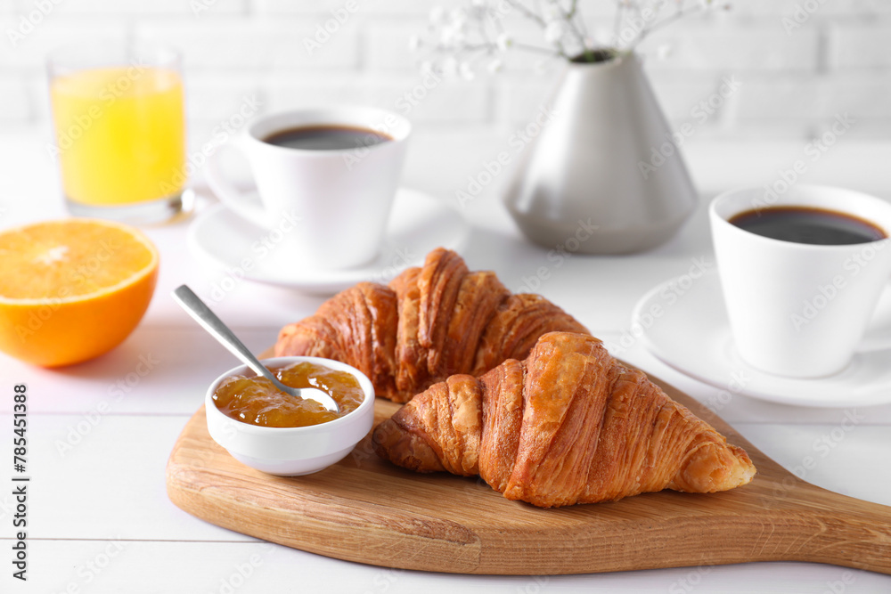 Croissants and jam on white wooden table. Tasty breakfast Croissants and jam on white wooden table. Tasty breakfast