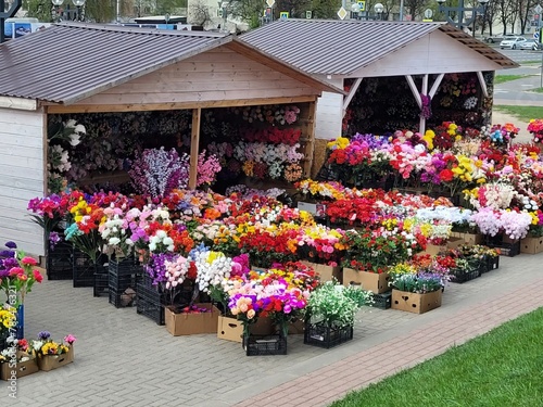 Street sale of artificial plastic flowers for Easter or Radunitsa