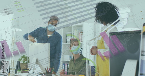 Image of financial data processing over diverse business people in face masks in office