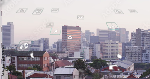 Image of eco icons and data processing over cityscape