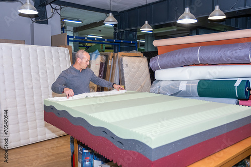 A man in his mattress shop