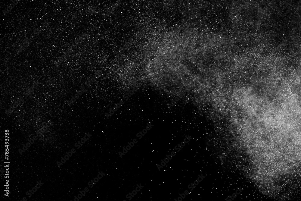 	
Abstract splashes of water on black background. White explosion. Light clouds overlay texture.	

