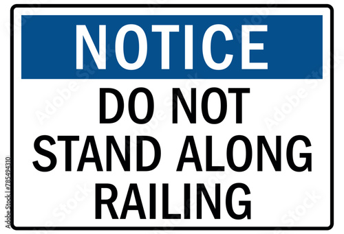 Railroad warning sign do not stand along railing