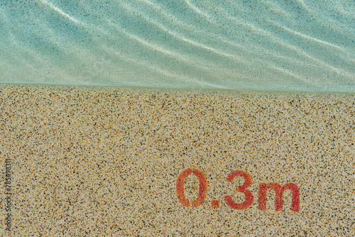 Entrance to the pool with a depth indication of 0.3 meters.